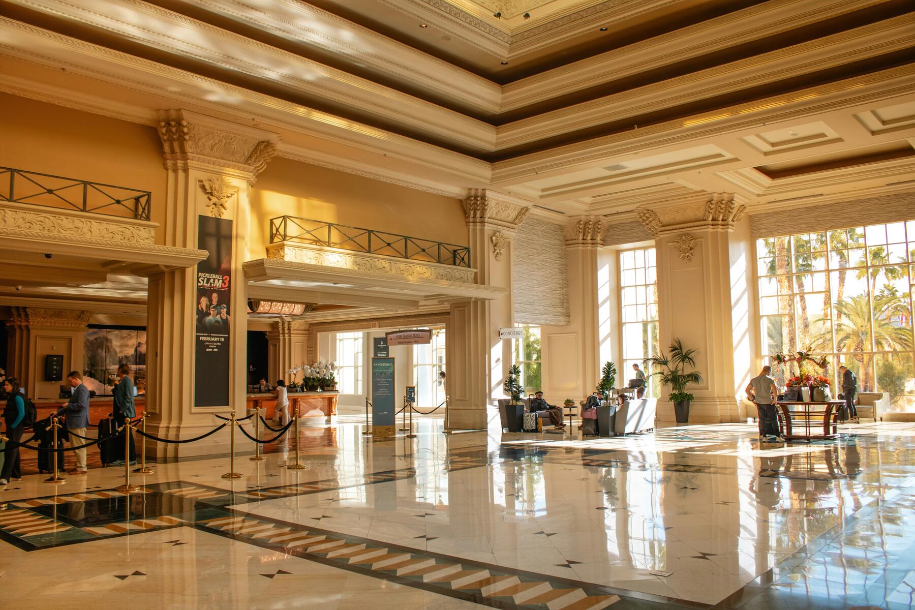 The residents' lobby — marble underfoot, brass overhead